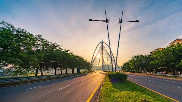 Photo of A colorful bridge by the river