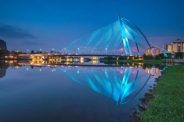 Photo of A colorful bridge by the river