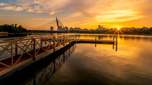 Photo of A colorful bridge by the river