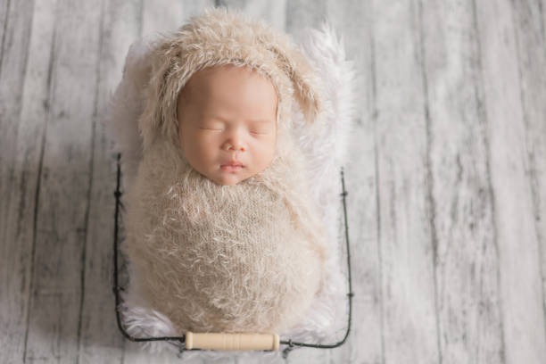 istock Adorable newborn baby sleeping in cozy room. 1168319480