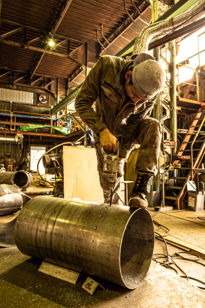 istock Japanese man working at the iron factory. 1168324975