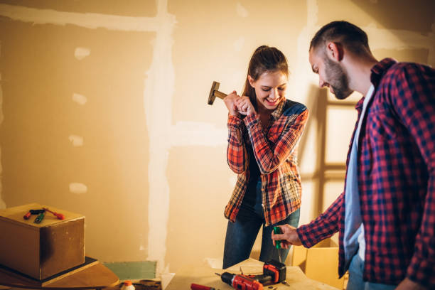 istock Young couple renovating their new home 1168327996