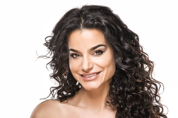 istock Beautiful brunette female posing for studio portrait 1168332838