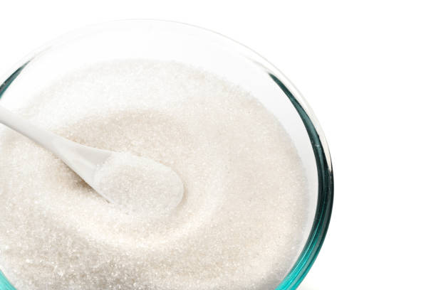 istock Sugar in glass bowl isolated on white background - Image 1168335007