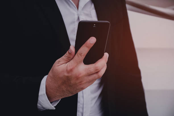 istock Businessmen wearing a black suit 1168335379