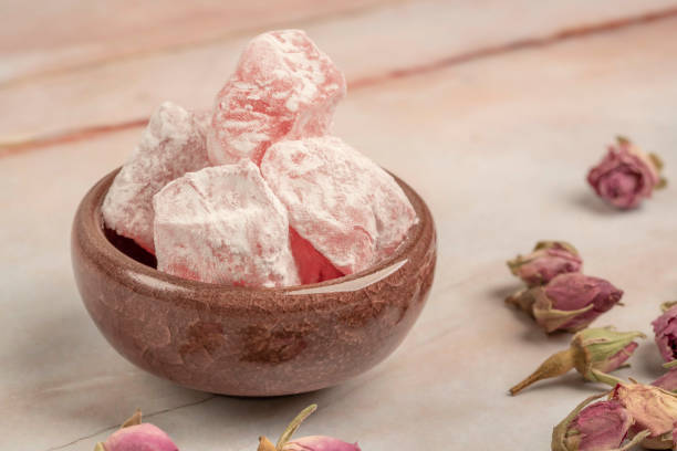 istock Turkish delights and edible roses on table 1168337654