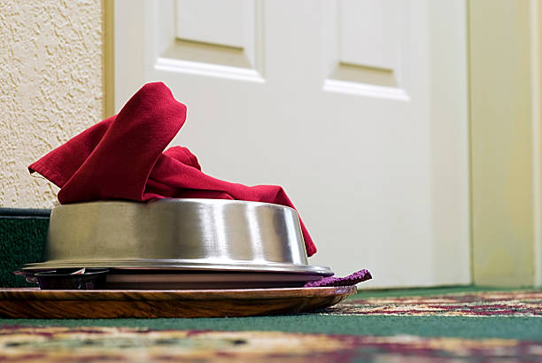 Room Service Covered Serving Plate Sitting Outside of Hotel Door stock photo