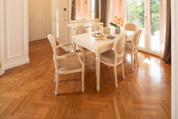 istock Decorated modern dining room, kitchen. Homemade dessert, apple pie with blueberries  ready to serve. 1168338351