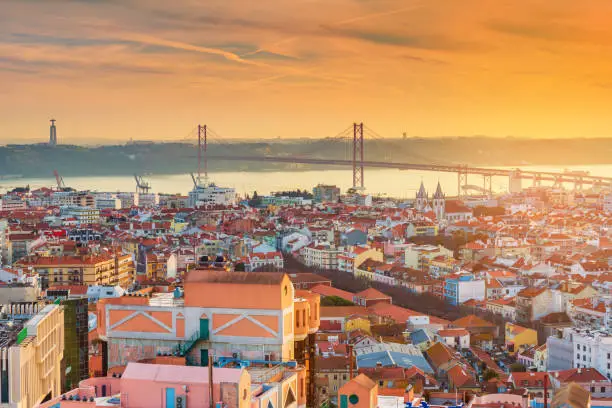 Picturesque sunset over Lisbon, Portugal. Evening panorama of the Portuguese capital city.