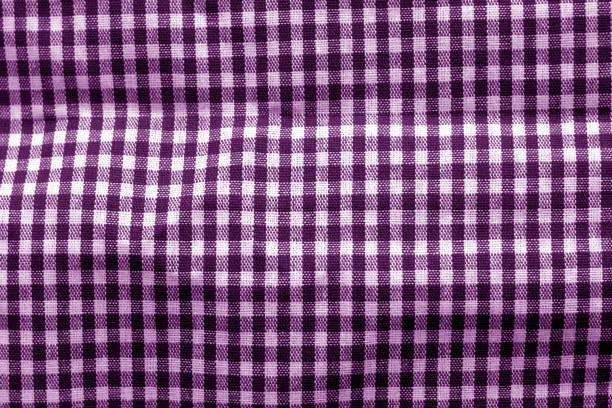 istock Checked fabric texture in purple tone. 1168339703