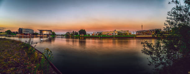 Wolfsburg Germany June 17 2019 : view the Autostadt an Phaeno in Wolfsburg at sunset Panorama
