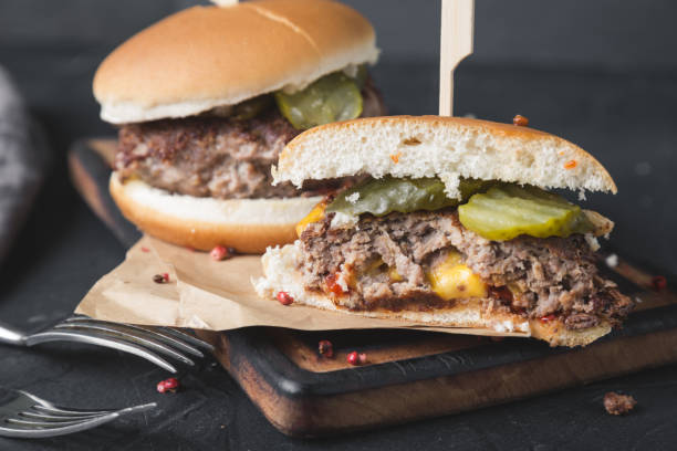 istock Burger stuffed with cheddar cheese. Juicy Lucy 1168341784