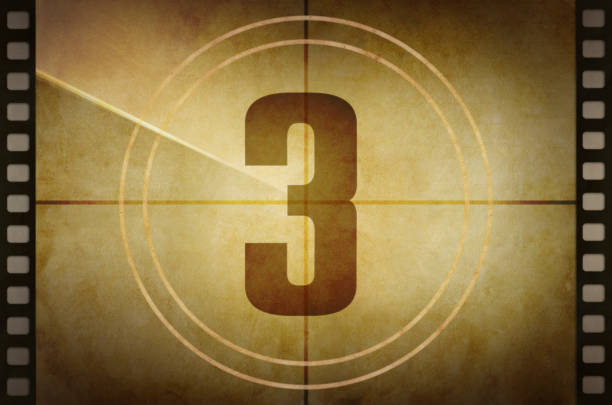 Vintage old film projector countdown screen with the number 3 at the center Vintage old film projector countdown screen with the number 3 at the center. countdown photos stock pictures, royalty-free photos & images