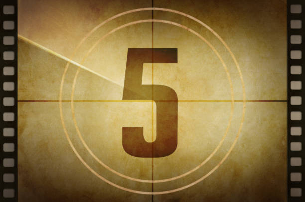 Vintage old film projector countdown screen with the number 5 at the center Vintage old film projector countdown screen with the number 5 at the center. countdown photos stock pictures, royalty-free photos & images
