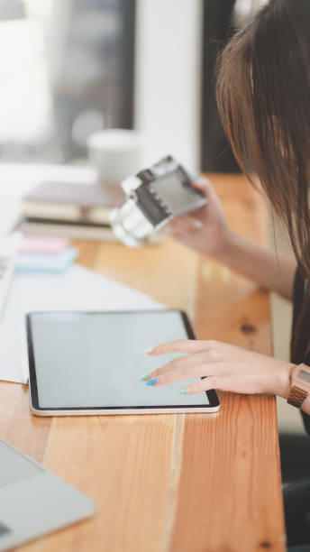 istock Cropped view of female graphic designer working 1168351565