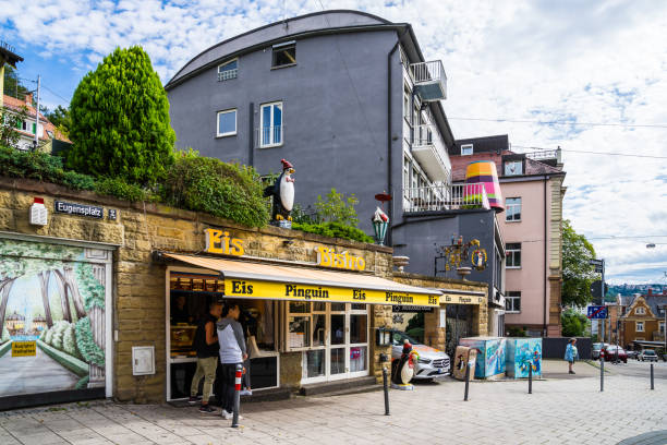 Stuttgart, Germany, August 15, 2019, Popular ice cream parlor called eis pinguin serving first class ice cream at famous eugensplatz square with fantastic view over downtown in basin