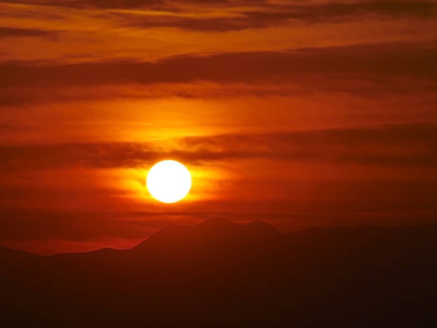 istock beautiful golden sunset sky landscape 1168353708
