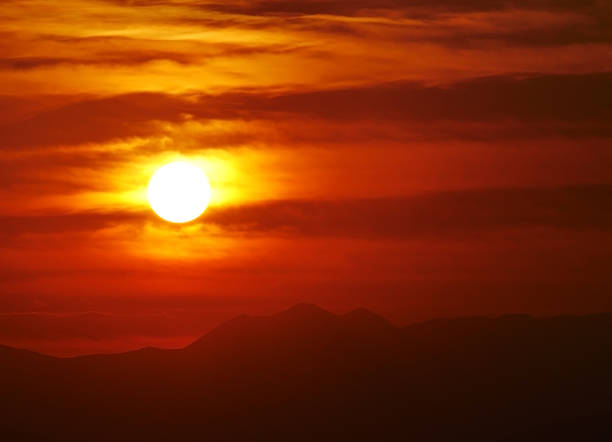 istock beautiful golden sunset sky landscape 1168353938