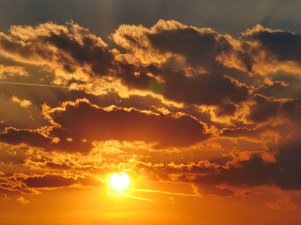istock beautiful golden sunset sky landscape 1168353989