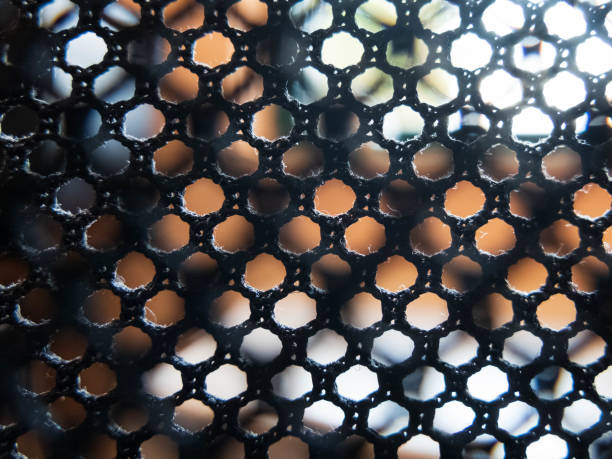 istock Black textile transparent furniture upholstery mesh. Background textured seamless pattern 1168357704