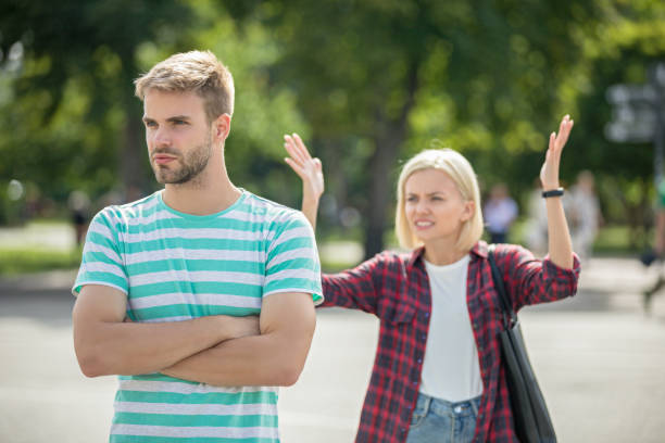 istock Couple fighting on street 1168358820