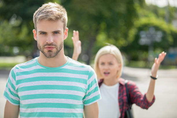 istock Couple fighting on street 1168358868