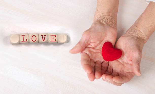 istock Word LOVE composed of wooden dices. 1168360085