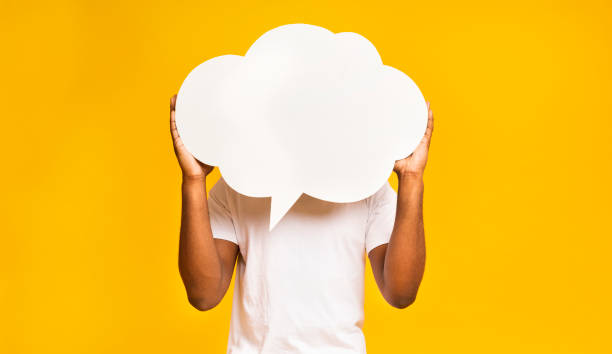 istock African american man holding an empty speech bubble 1168361494