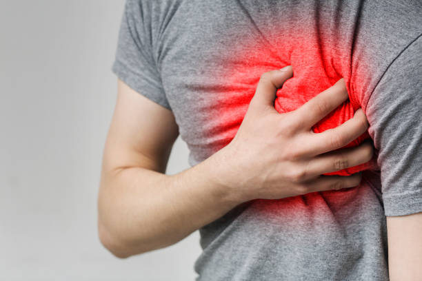 istock Caucasian man having heart ache, holding hand on chest 1168364048