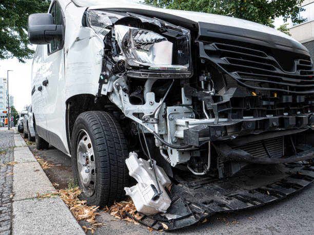 istock Front of white van  damaged by accident 1168366639