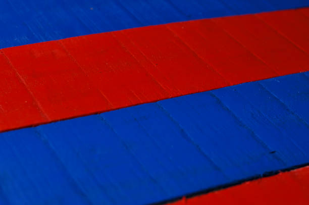 istock Wooden striped blue and red background. Wooden texture, copy space 1168366681