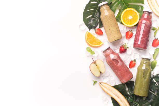 istock Fresh fruit detox cocktails on white background 1168369334