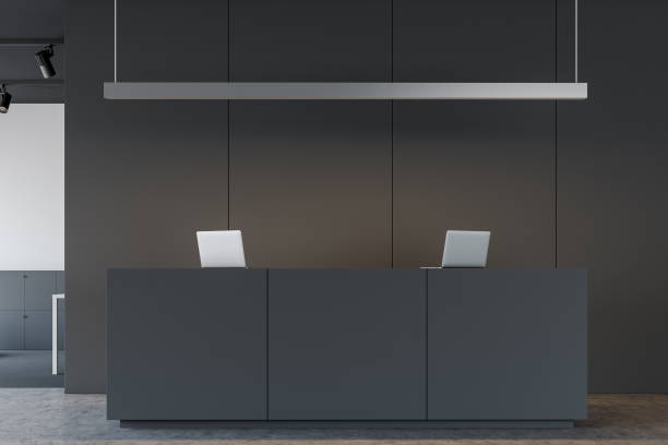 istock White and gray office reception desk 1168369349