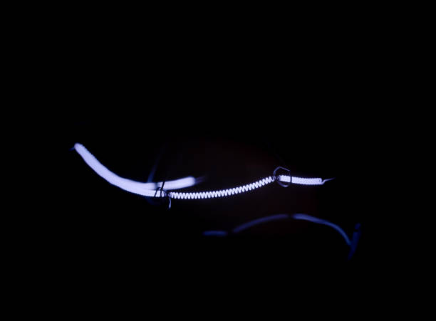istock glowing spiral in the dark close up 1168370862
