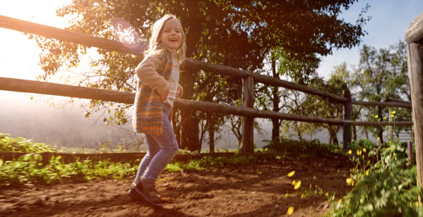 istock Girl walking outdoors 1168371115
