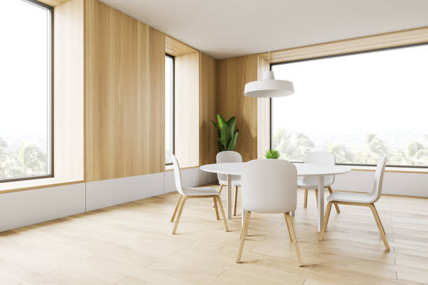 istock White and wooden dining room corner 1168371616
