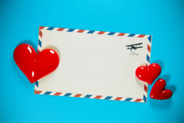 close-up of red heart shape on air-mail envelope - air mail mail envelope blank imagens e fotografias de stock