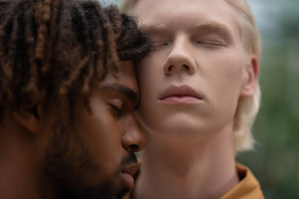 istock Handsome men with different skin color closing eyes 1168376633