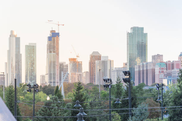 istock Building under construction with working cranes in downtown Chicago at sunset 1168378998