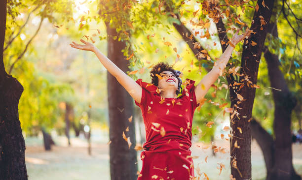 istock Throwing leaves in the air 1168379979