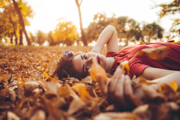 istock Lying on autumn leaves 1168380071