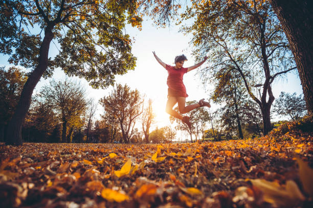 Jump of joy in a park