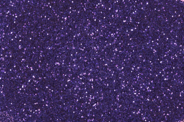 istock Violet glitter background. Low contrast texture of glitter. 1168381227