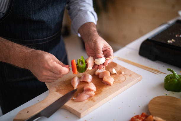 istock Making skewers with meat and vegetables 1168381310