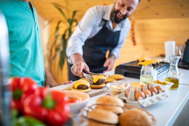 istock Delicious cheeseburgers almost ready to eat 1168381762