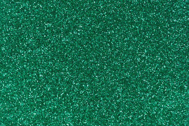 istock Light green glitter texture, background for awesome holiday design. 1168383203