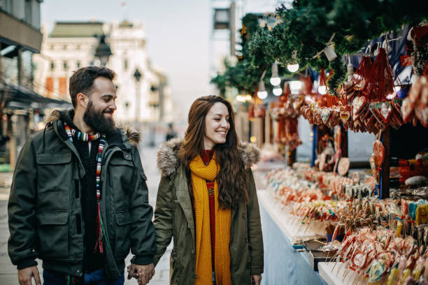 istock Young couple shopping for Christmas 1168385043