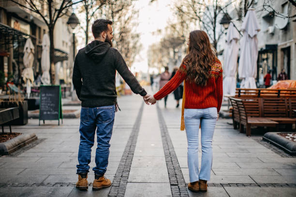 istock Young couple shopping for Christmas 1168385550