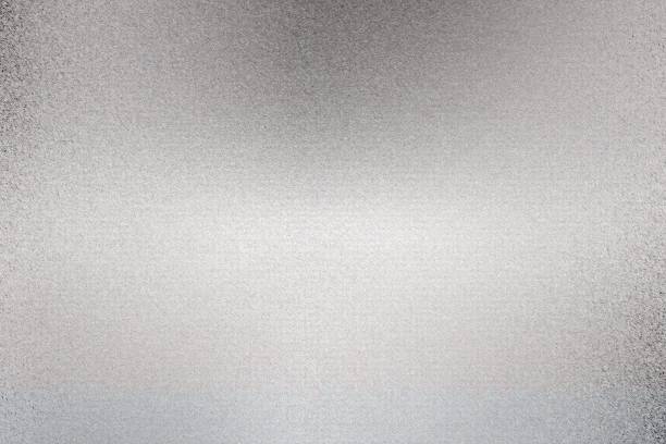 istock Glowing silver foil metallic sheet with scratched surface, abstract texture background 1168386915