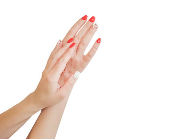 istock female hand manicure red isolated 1168388214